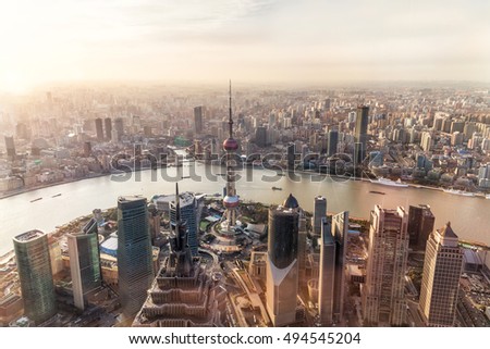 Shanghai cityscape and skyline at sunset