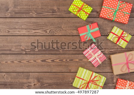 Christmas presents on wooden table