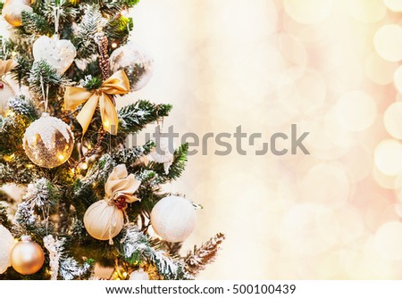 Christmas tree with Christmas decorations on a holiday background