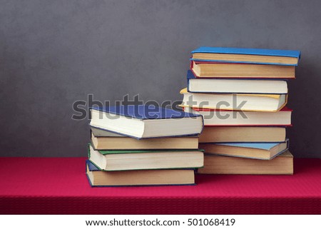 Pile of books on a table. Education, back to school.