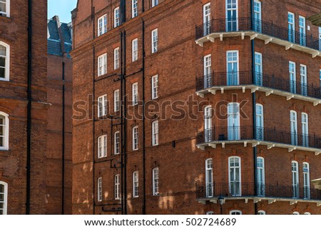 Red bricks houses in London, english architecture, in a sunny day