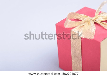Gift boxes with bow on gray background. Decoration.