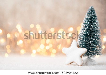 Blur light celebration on christmas tree with wall background.