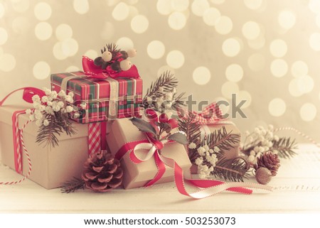 Different Christmas presents with handmade decoration.Vintage style,toned image
