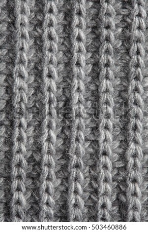 Gray knitted fabric background