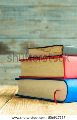 Books on the wooden old background