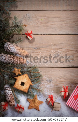 Christmas background with decorations  on wooden board