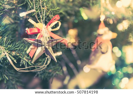 Decorated Christmas tree on blurred, sparkling