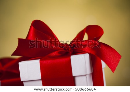 Christmastime celebration, Gift box with red ribbon bow
