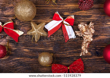 New Year's and Christmas. multi-colored Christmas toys on a wooden table, top view.