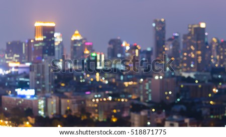 Night light blurred bokeh city office downtown, abstract background