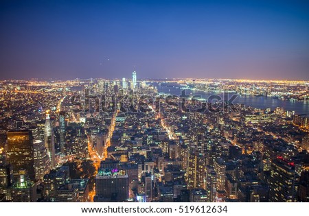 Aerial night view of Manhattan from rooftop.