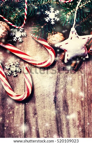Christmas fir tree with decoration on dark board - Christmas Card with festive decor