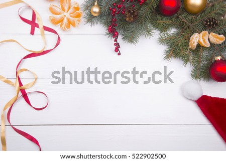 Christmas decor on white wooden background.