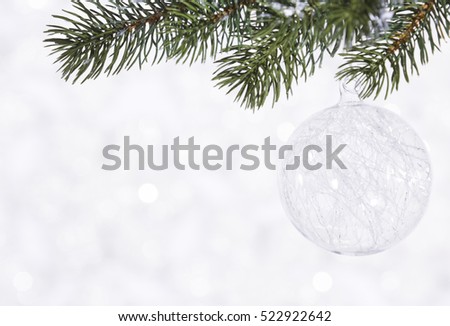 Beautiful shiny ball on a winter background