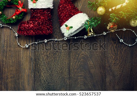 Top view Christmas background.decoration and jewelry clothesline on wooden table  with copy space.