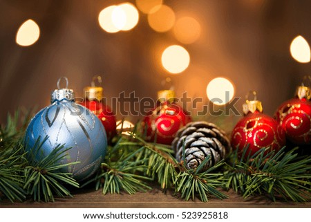 Christmas background with decorations on wooden board