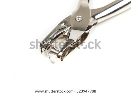 Silver hole punch isolated on white background