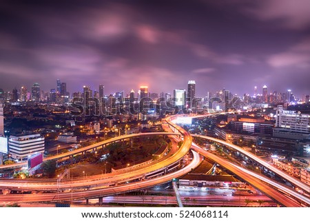 Bangkok cityscape night view with twilight sky, expressway and highway top view, Thailand