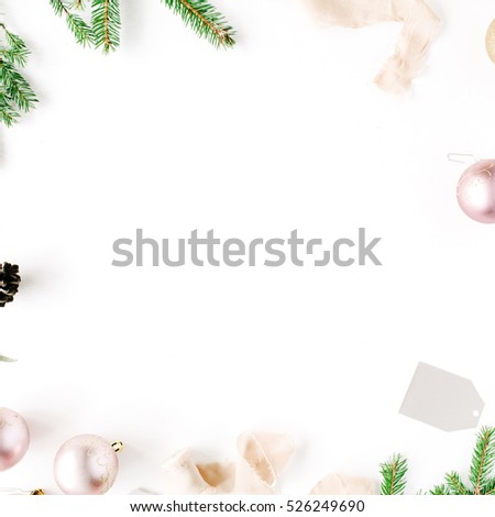 Christmas composition. Frame with fir branches, pine cones, christmas balls, ribbon and tinsel. Flat lay, top view