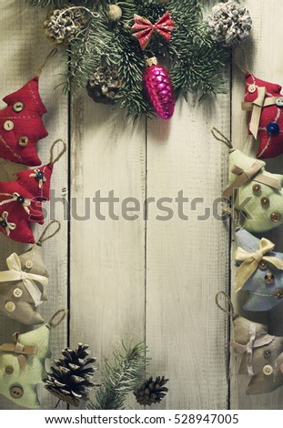 Christmas New year composition with toys on the old wooden background.Top view with copy space