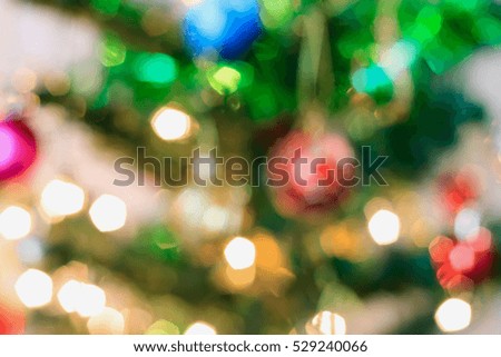 Abstract Christmas tree with decorations bokeh light blur background