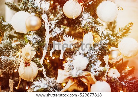 Detail of Christmas tree with decorations. New years eve concept