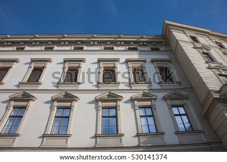 Elegant Building architecture. Building's Facade in Vienna. Facade building. Building background. House wall structure. Building detail, the background. Morning Vienna.    