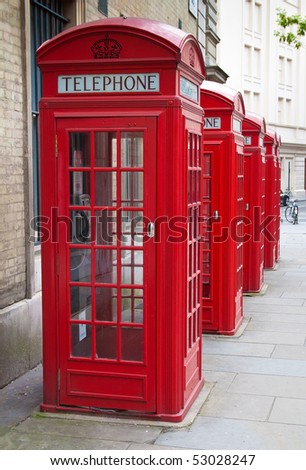 A group of typical red London phone cabins