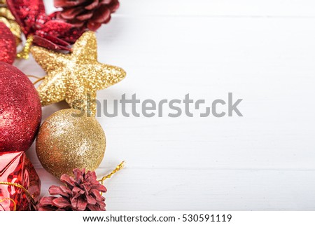 Christmas set, Christmas toys space for text on the greeting card. gold and red toy.