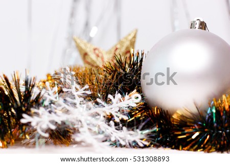 Happy new year 2017. White and gold christmas ornaments on white background. Merry christmas greeting card. Winter holiday xmas theme. Space for text.
