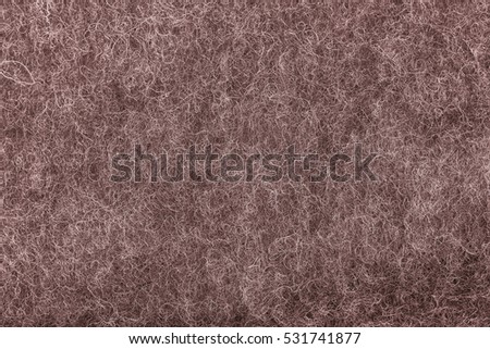 brown felt fabric texture as background. melange fuzzy woolen cloth texture