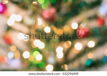 Abstract Christmas tree with decorations bokeh light blur background