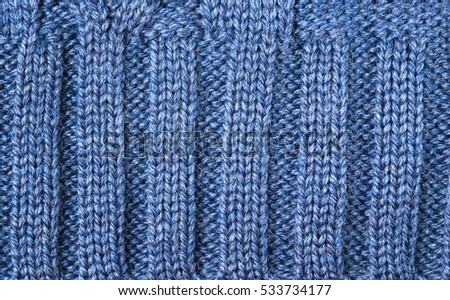 Texture  Fabric Wool, Knitted blue pattern close-up