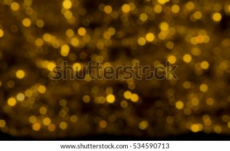 gold and white bokeh lights christmas defocused. abstract background