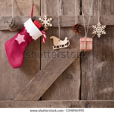 Christmas stockingwith gifts on  wooden wall