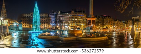Trafalgar Square panorama at night with Christmas tree 
