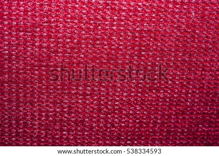 Carpet texture. Red colored hand made, handwork.