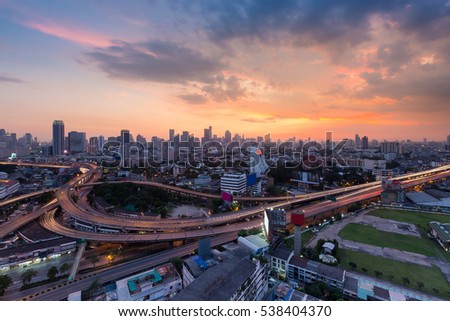 Sunset sky background over Bangkok city and highway interchanged, Thailand