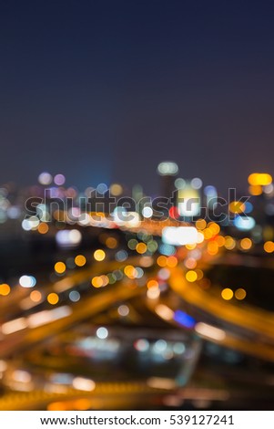 Night blurred lights city highway overpass interchanged, abstract background