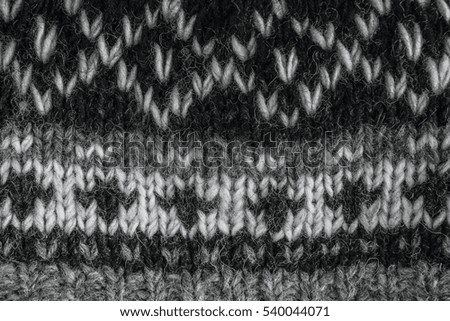 Real knitted fabric textured background. Ornament Norwegian style
