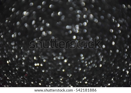 Silver glitter background black bokeh abstract Christmas