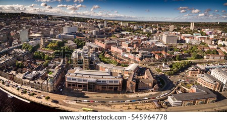 Aerial view of Newcastle quayside and NE1 post code taken over the River Tyne in early evening.