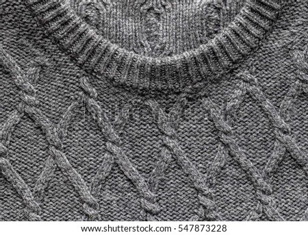 Handmade grey knitting wool texture background

