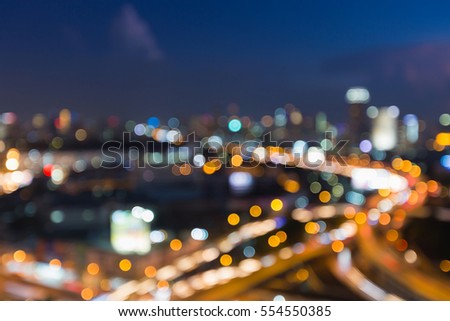 Abstract blurred lights, city downtown and highway road interchanged night view