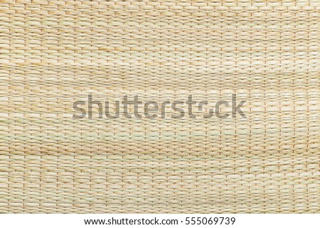 Natural straw made floor mate of East Asia for background.