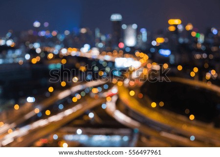 Abstract blurred light highway intersection and city downtown background