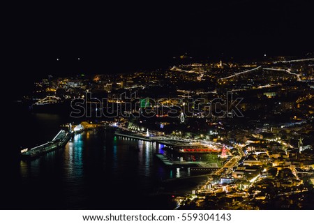 View of Funchal harbor and city at night.