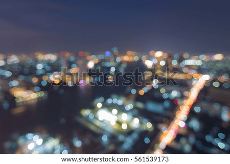 Blurred lights city of Bangkok at night, aerial view