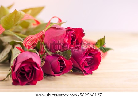 Red rose on wooden board with copy space, Love concept for Valentines Day